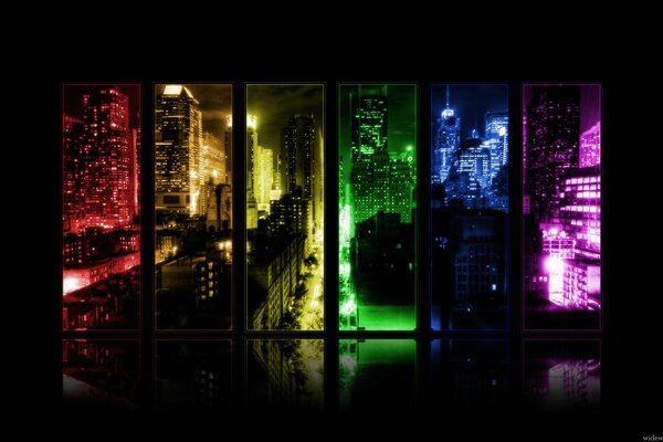 View of the night city in the multicolored windows