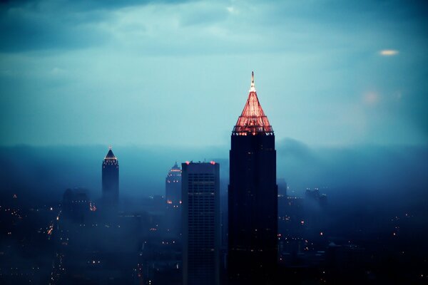 Beautiful high-rise buildings in thick fog