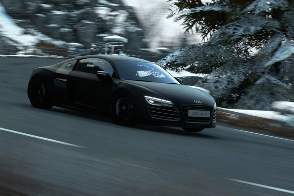 Audi auf der Strecke und Hintergrund des verschneiten Waldes