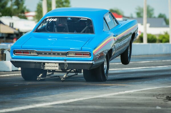 Photo of a car at a drag racing race