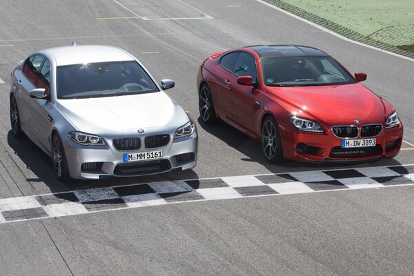 Bmw m5 and m6 coupe at the start