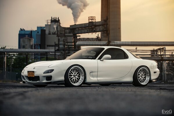 Long white Japanese car mazda rx-7 evano gucciardo