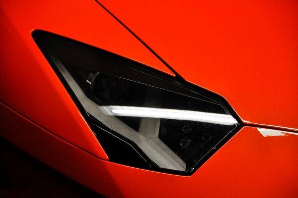 The Lamborghini headlight is like a black diamond