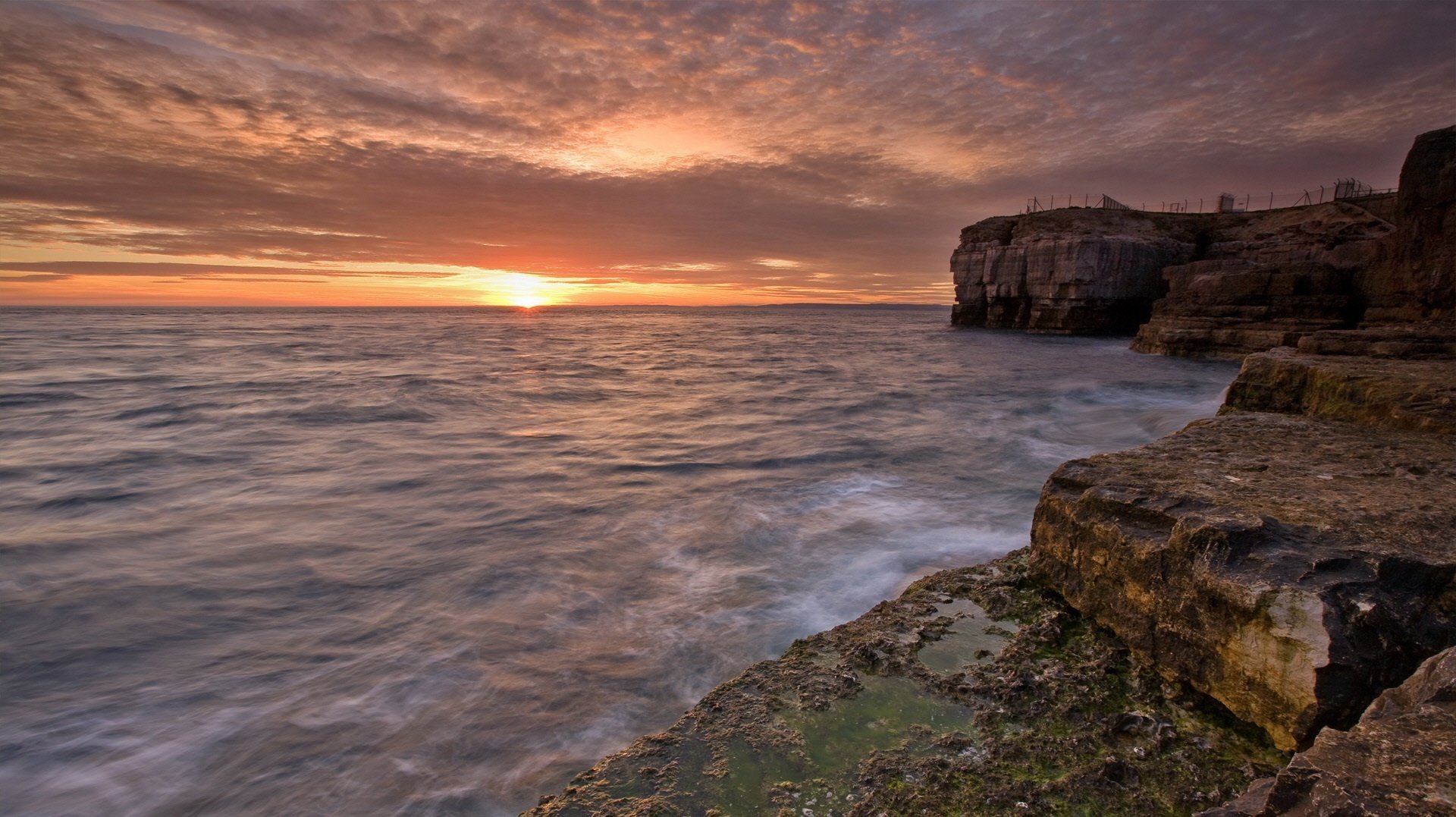 tone stairs the wind surf sunset water the sky sea horizon the evening wave rock