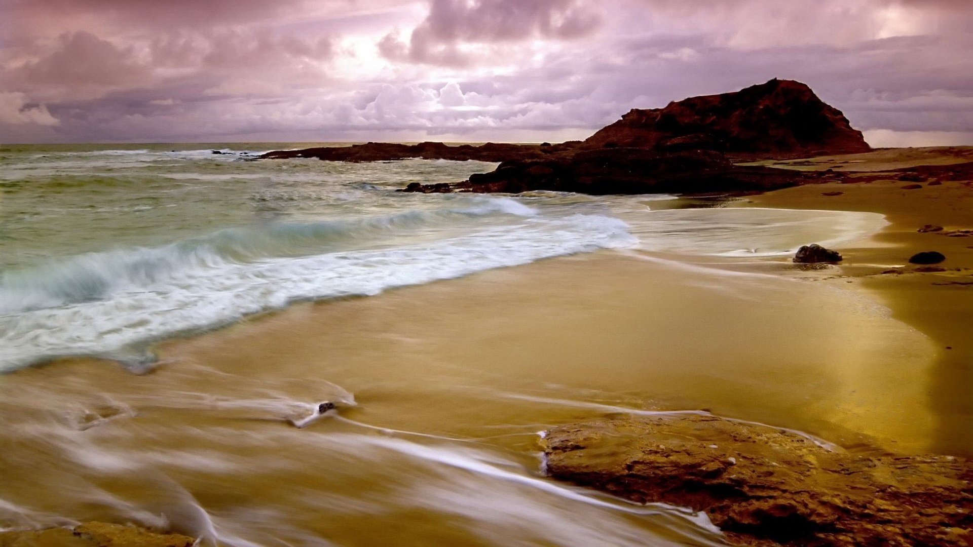 wildlife the waves of the sea the sand water shore sea wave stones rocks horizon the evening surf beach clouds nature landscape