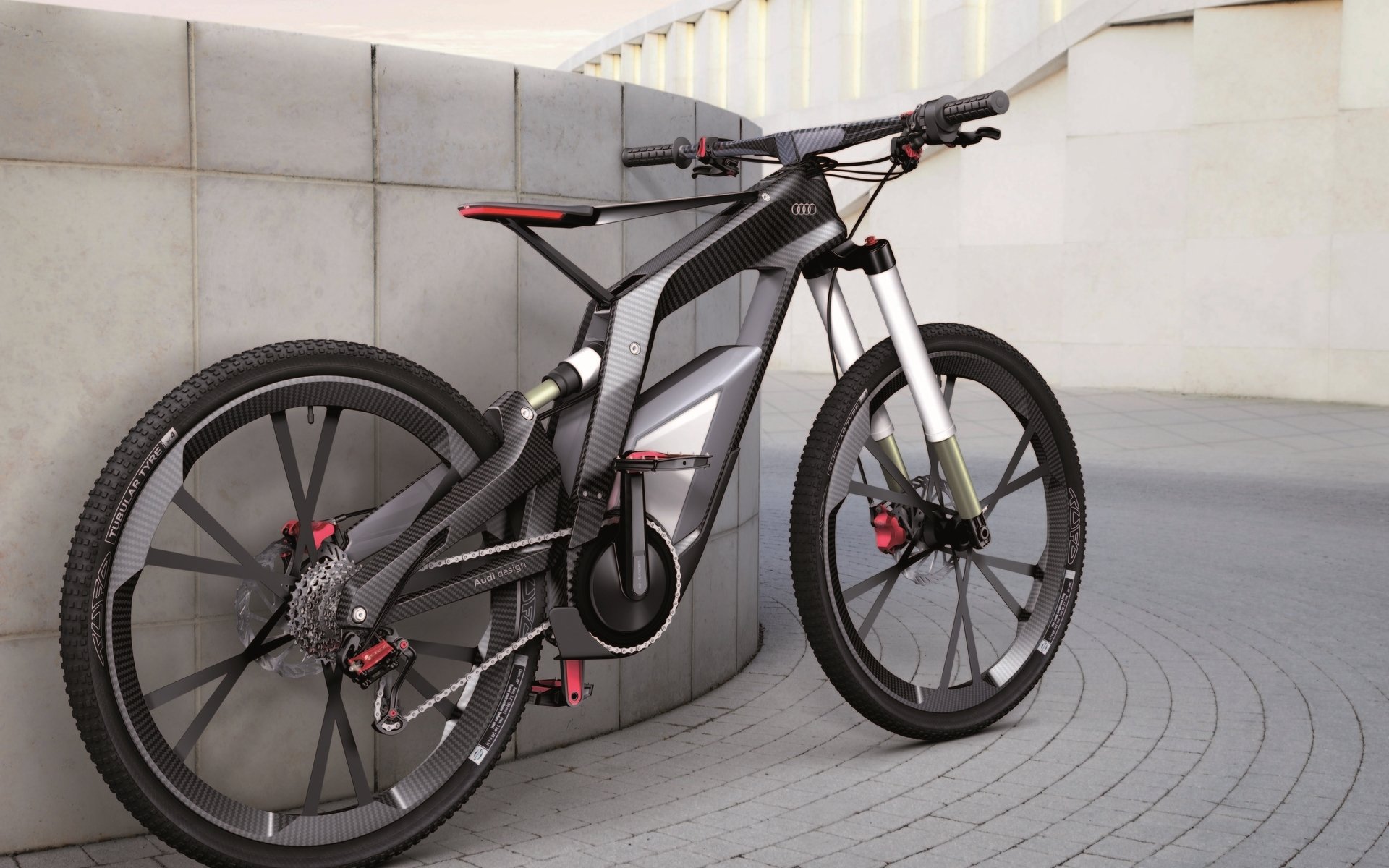 audi biciclette ruote pavimento parete