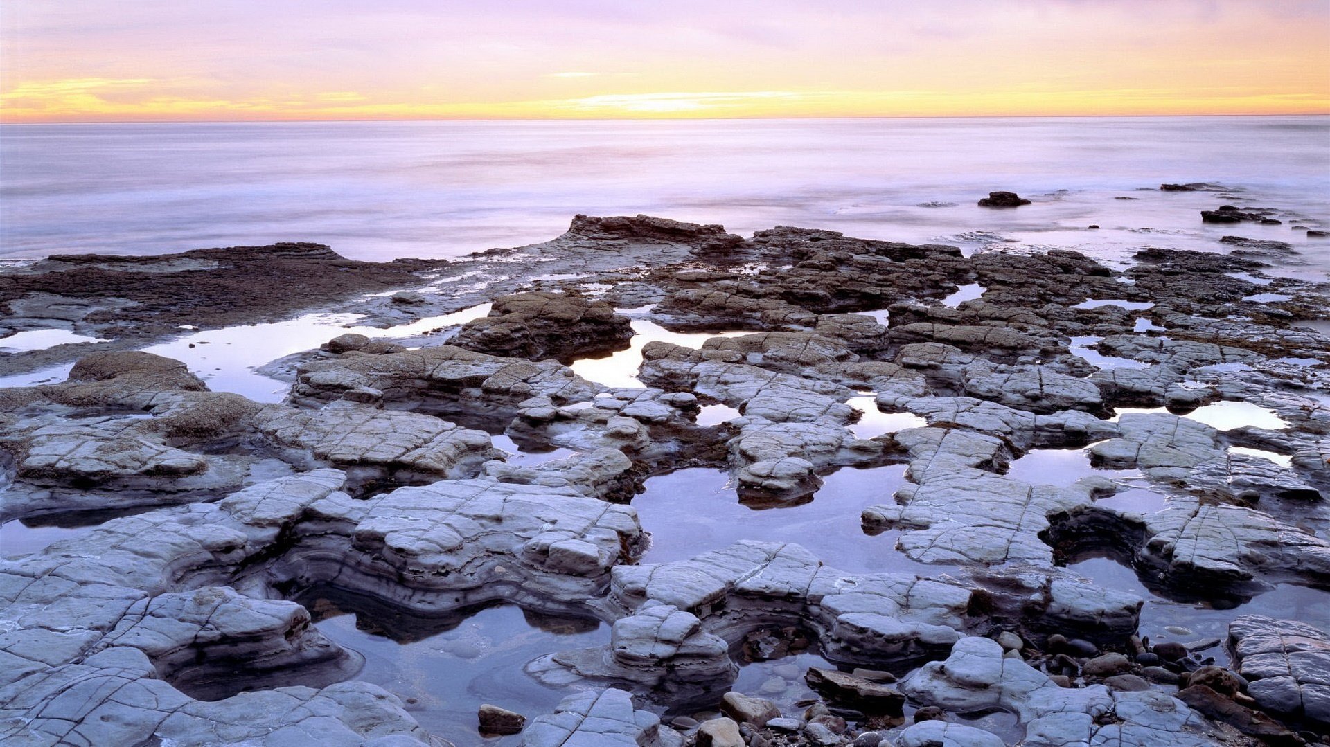 clay shore water cracks horizon water nature sky landscape