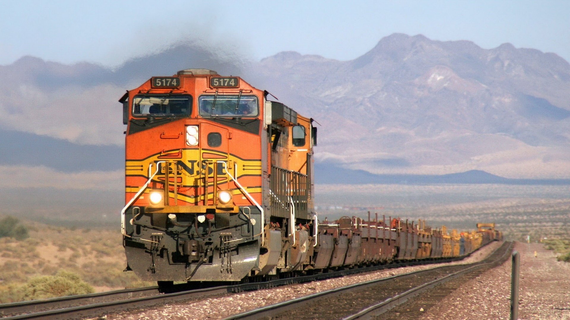 long tail train wild west transport mountain