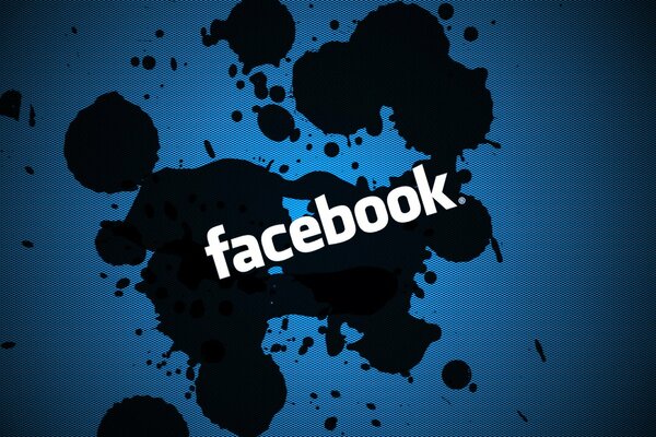 Логотип социальной сети facebook на фоне темных клякс