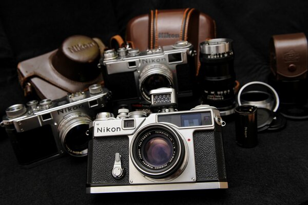 Vintage cameras with leather cases