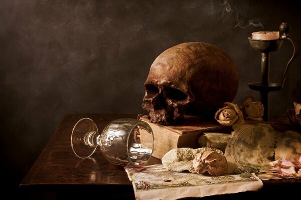 Still life with a skull, a glass and a candlestick