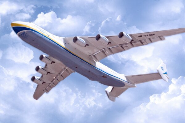 Obraz z unoszącym się na niebie samolotem