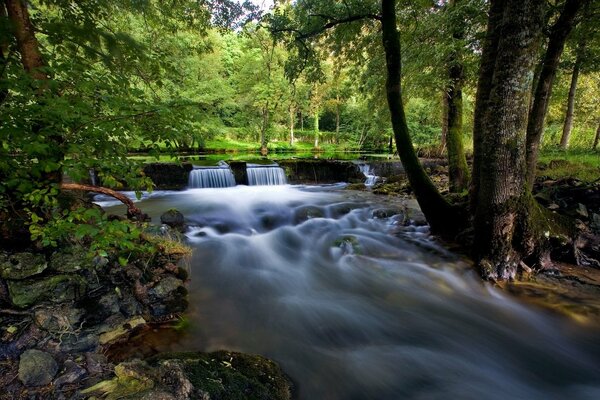 A small waterfall of a mountain river