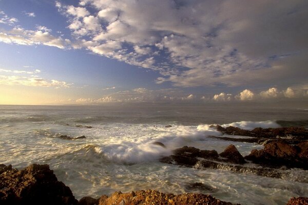 Natural landscape . Rocks in the clouds