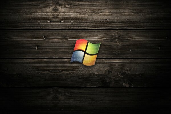 Microsoft logo on a wooden background