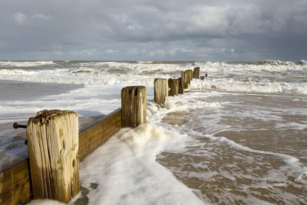 Sea surf in the middle of a snowy winter