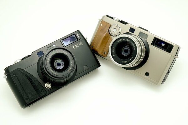 Black camera tx. Silver with wood camera tx