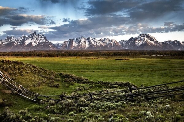 Mountains behind a small fence. Landscape