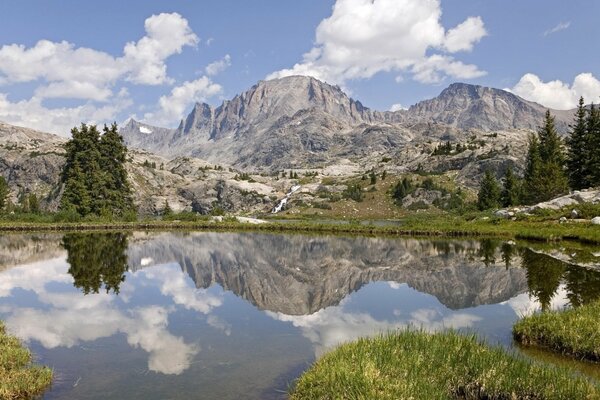 The lake is surrounded by a stone ridge