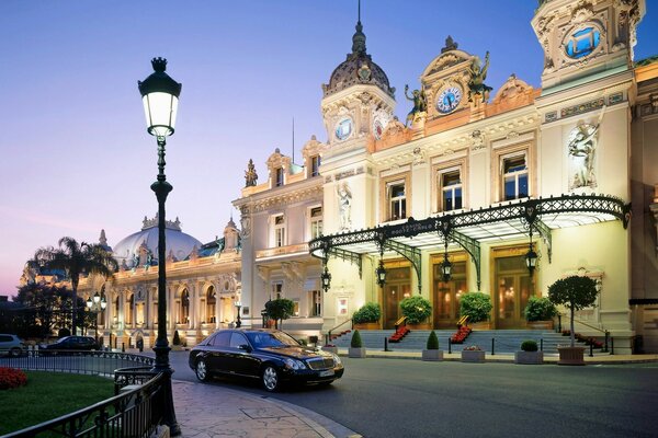 Casino building. Car under the streetlight