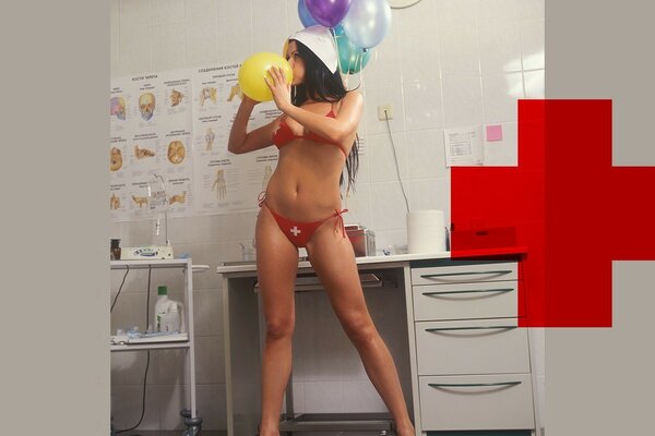 Gorgeous nurse in underwear with balloons