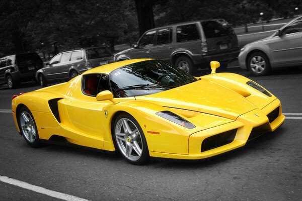 Yellow Ferrari on the road in the city