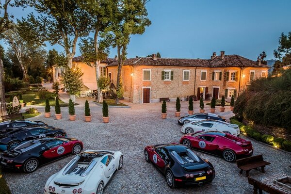 Sports cars in the courtyard of the villa