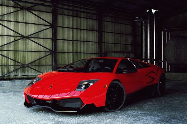 The red Lamborghini is in the hangar