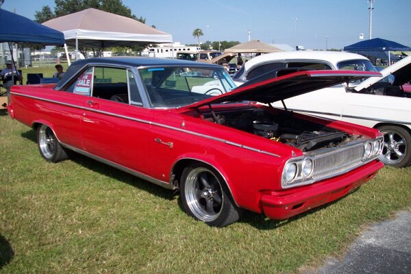 Red Classic Mopar with open hood