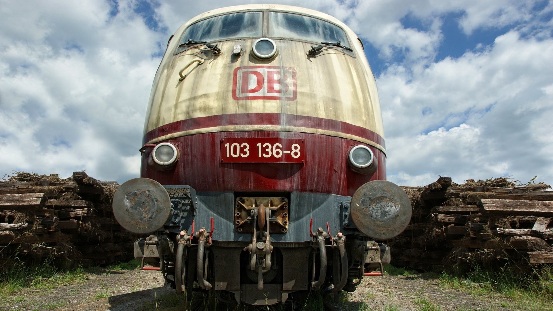 wooden warehouses locomotive clouds transport