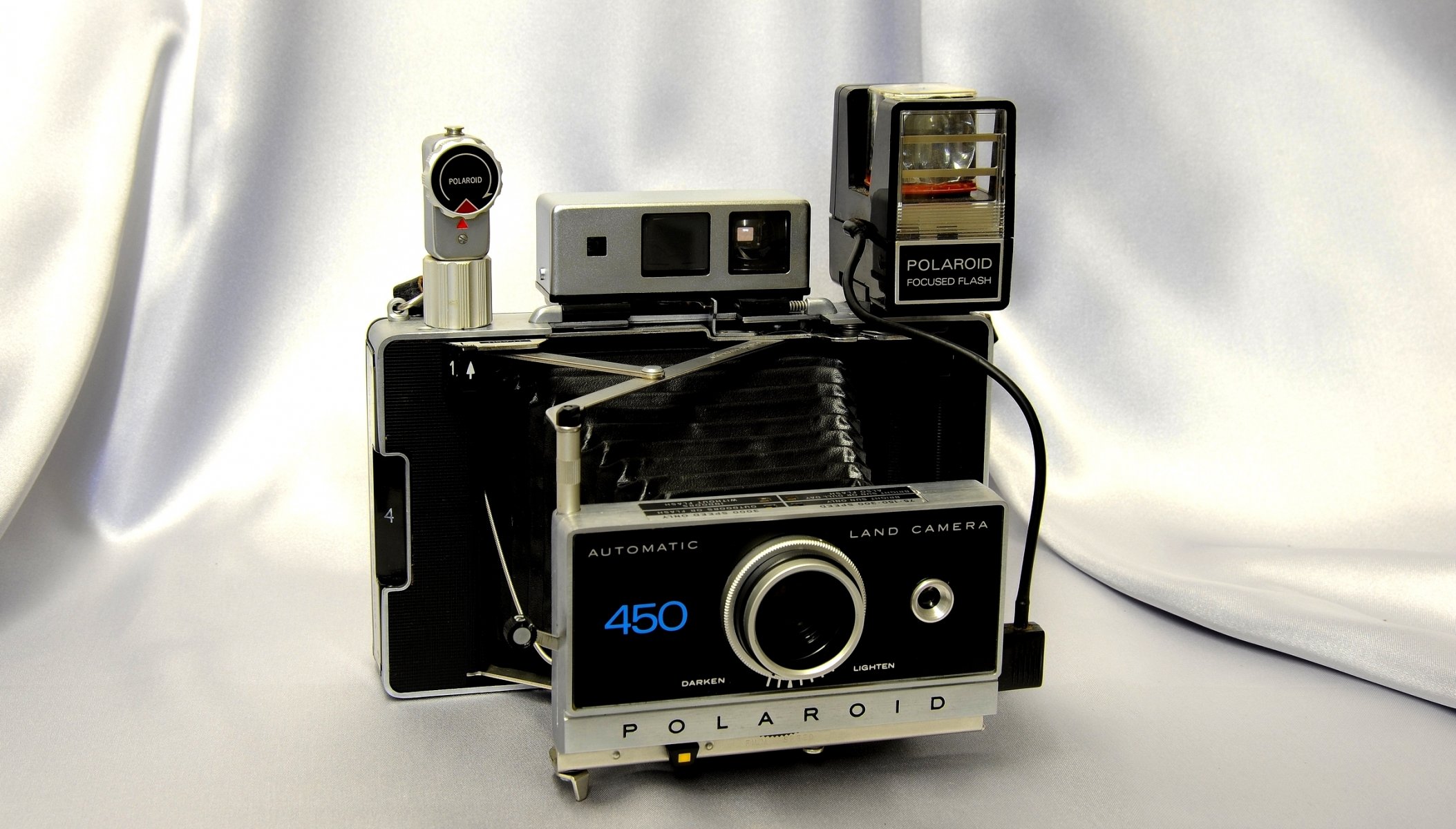 polaroid 450 aparat automatyczny lampa błyskowa wizjer tło