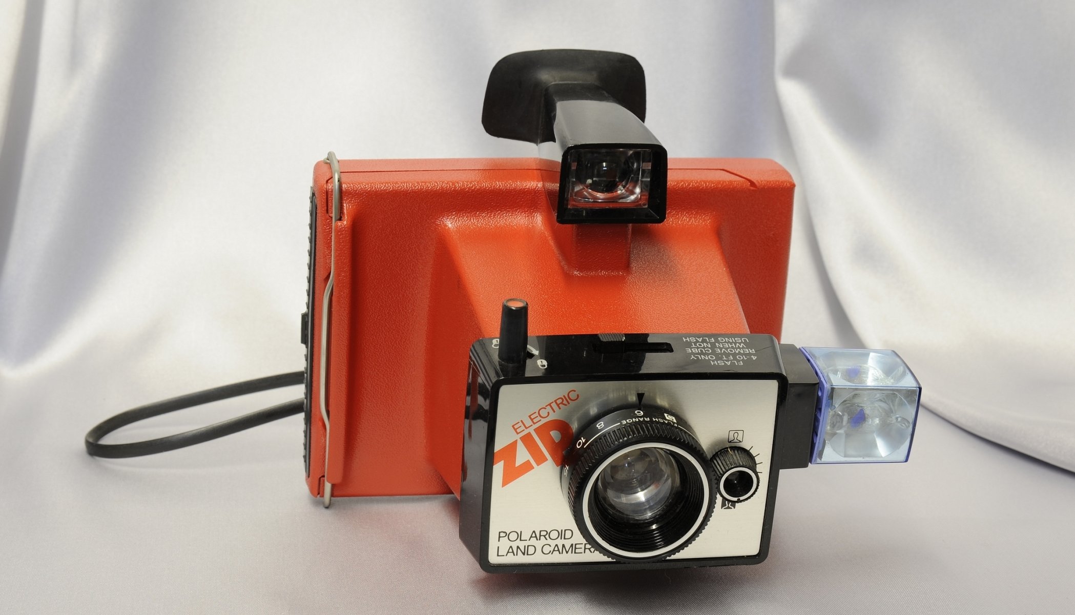 polaroid terra fotocamera paese elettronico macchina fotografica custodia in plastica lente mirino flash sfondo