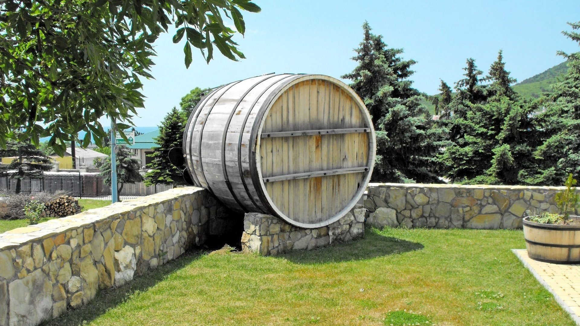 wooden barrel the grove plot mountains the fence fence wild stone tree grass greens wood