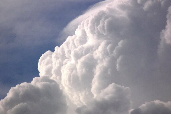 Marshmallow clouds among thunderstorms