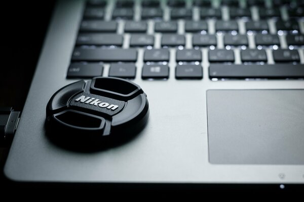 The lens cap is on the laptop