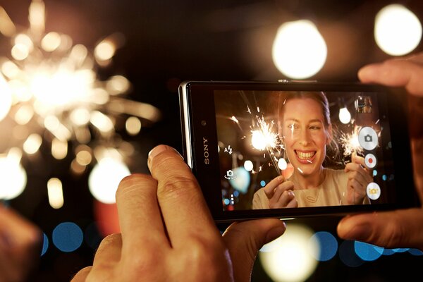 Photo of a girl with sparklers