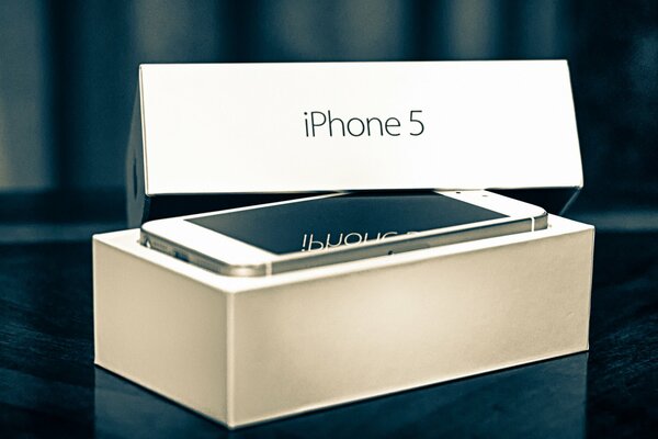 Photo of iPhone 5 in a white box