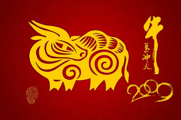 Symbole de l année Taureau d or sur fond rouge