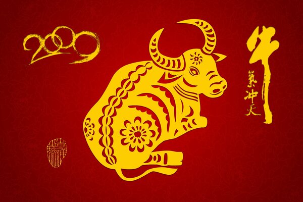 The symbol of the year is a yellow cow on a red background