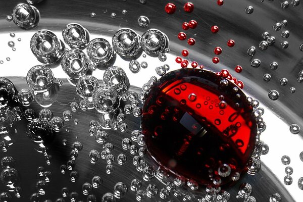 Drops on transparent and red glass