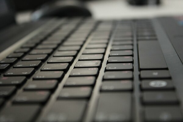 Black laptop keyboard. Macro photography