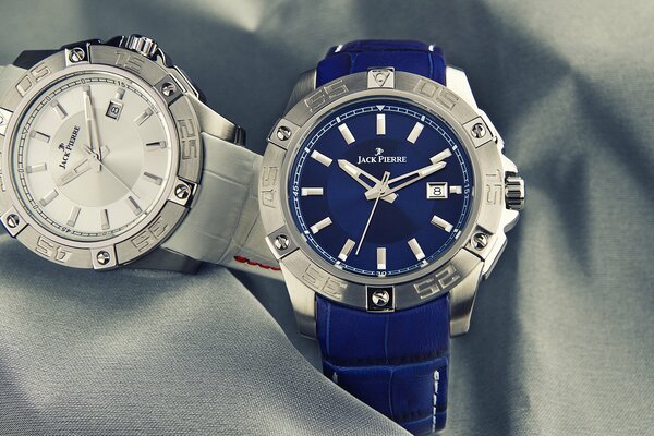 A pair of watches, blue and silver