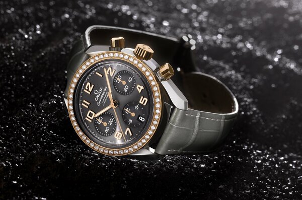 Omega speedmaster gold watch