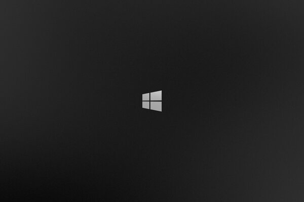 Sobre un fondo negro - ventana blanca del logotipo de Windows