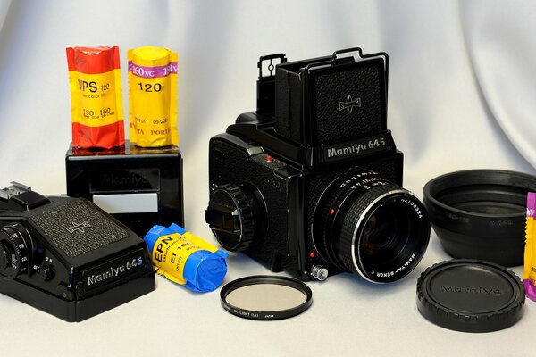 Mamiya M645 J camera lens and photographic films