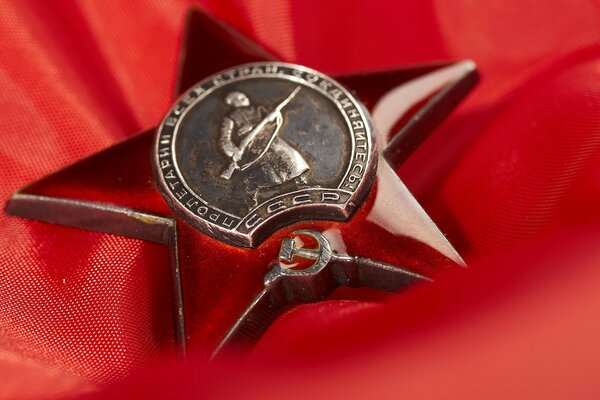 Metal star on a red background