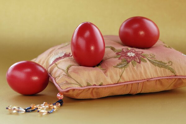 Painted Easter eggs on a pillow