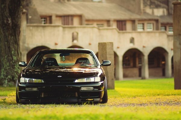 Sports car Nissan black coupe