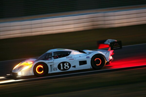 Sports car at high speed in the race