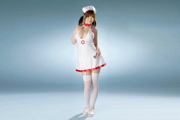 On a light background, an Asian nurse